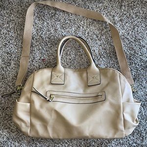Spacious tan/beige duffel bag